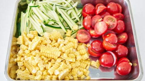 Fresh corn kernals, julienned zucchini, and cherry tomatoes for Pasta Estate (Summer Pasta).