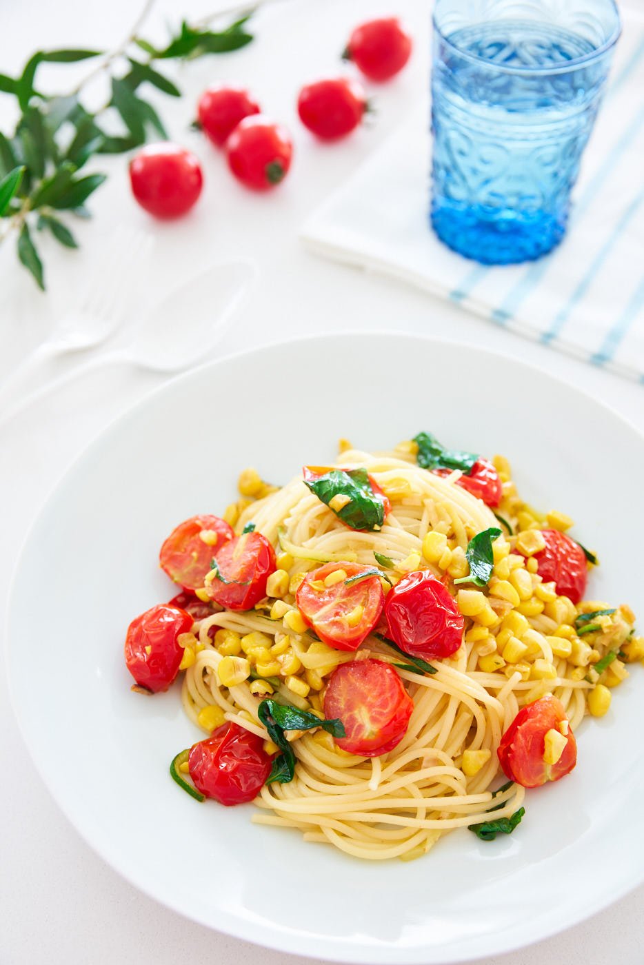 With pan-roasted tomatoes, corn and zucchini tossed with spaghettini and basil, this simple plant-based Pasta Estate captures all the goodness of summer on a plate.