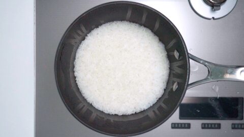 Cooked sushi rice in a pot.