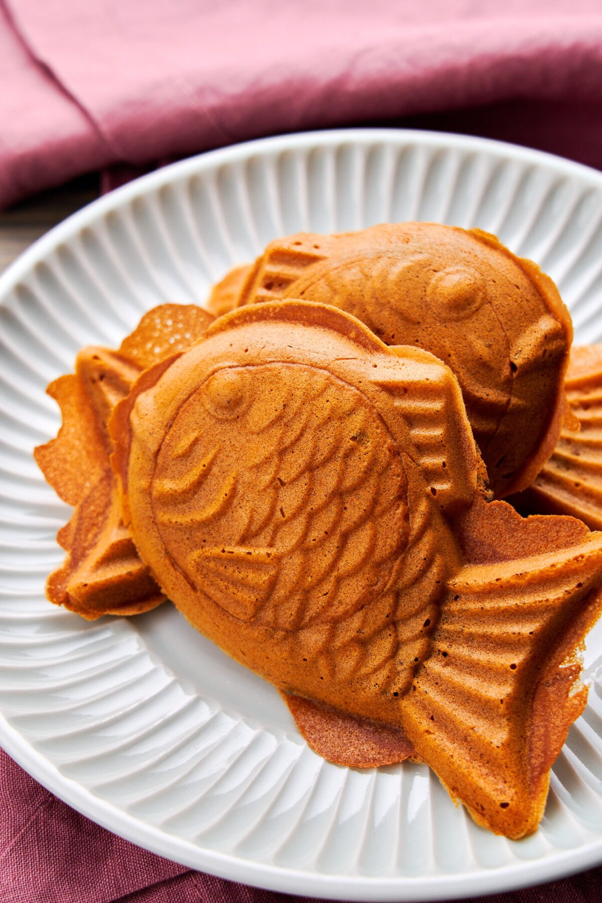 These crispy taiyaki are a Japanese fish-shaped pastry with a crisp buttery crust and sweet red bean paste in the center.