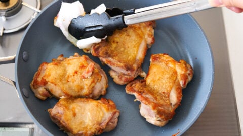 To get the teriyaki sauce shiny, remove any excess oil from the pan using a paper towel an tongs.