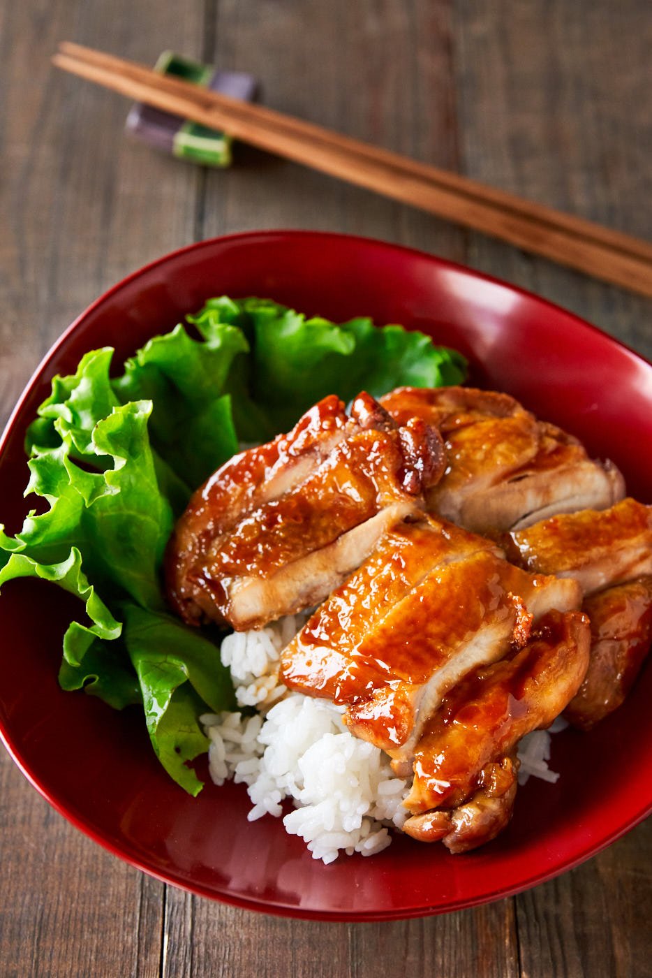 With just 4 basic ingredients, Japanese Chicken Teriyaki is as simple to make as it is delicious. The trick is to caramelize the sauce into a glossy glaze that sticks to the chicken like white on rice.