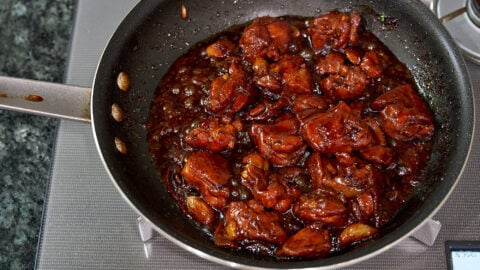 Reduce the sauce to a thick glaze to coat your Three Cup Chicken.