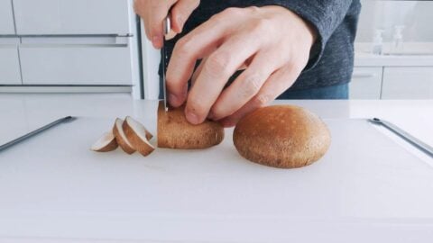 Slicing shiitake mushrooms.