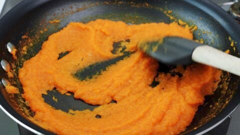 Reducing onion and carrot puree to make Japanese curry sauce.