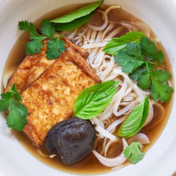 This vegan plant-based pho is so simple and yet the umami-packed mushroom broth is loaded with all the trademark flavors of traditional pho.This vegan plant-based pho is so simple and yet the umami-packed mushroom broth is loaded with all the trademark flavors of traditional pho.