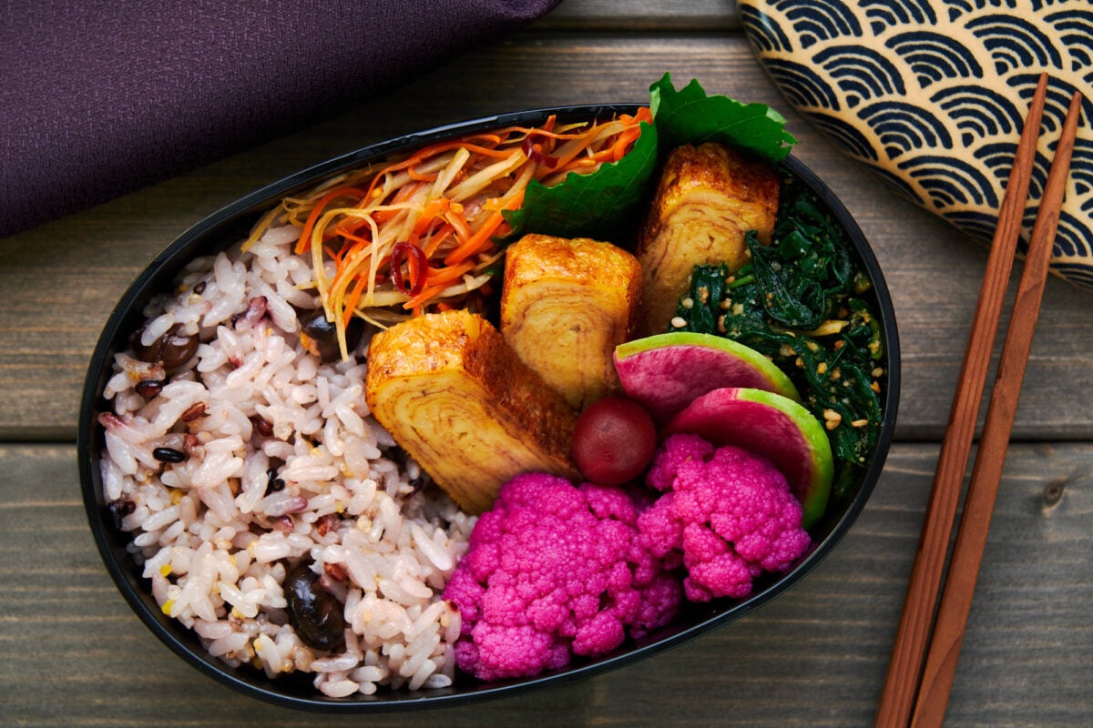 Packed with a rainbow of vegetable side dishes and a plant-based tamagoyaki, this vegan-friendly bento box lunch has a different texture, taste, and flavor in every bite.