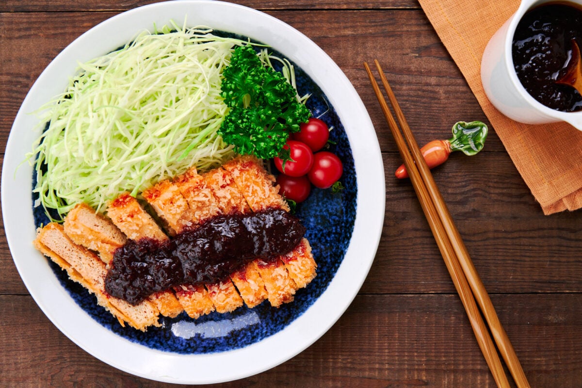 This flavorful tofu cutlet is infused with meaty umami and covered in an extra crispy panko crust. Glazed with a sweet and spicy homemade katsu sauce.